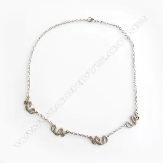 Russell Murphy vintage silver taniwha necklace,